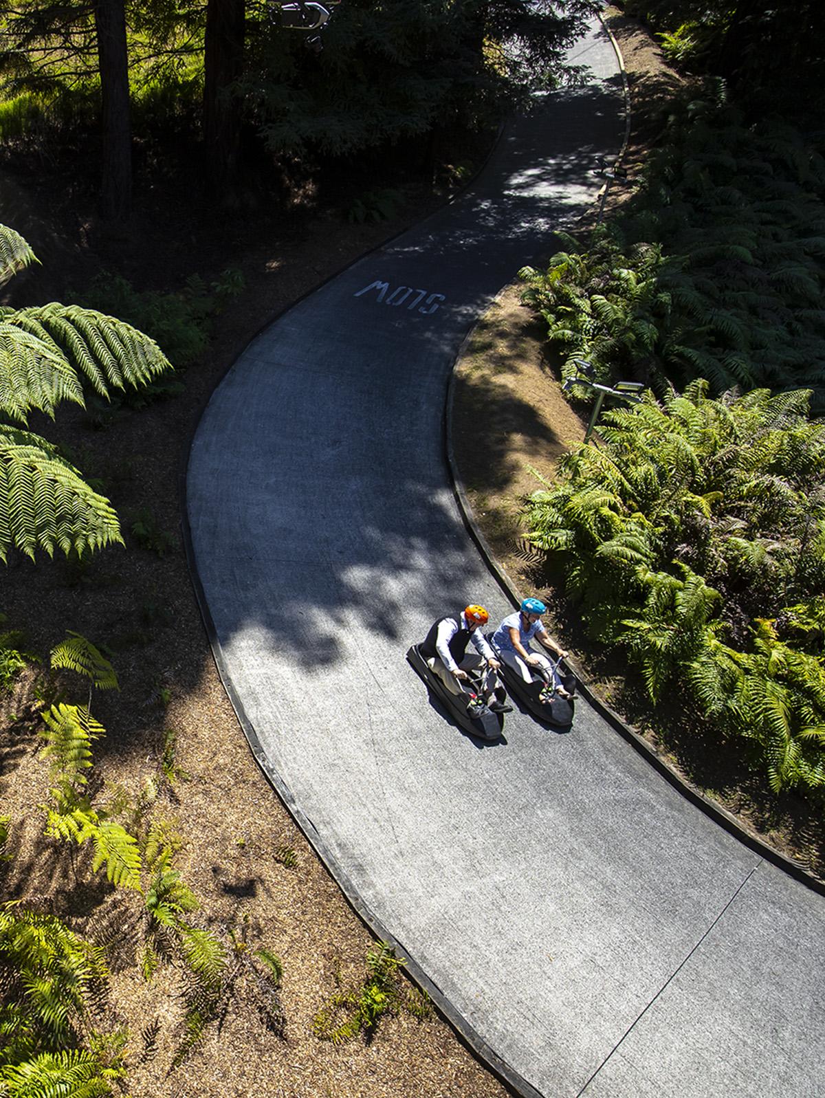 Aerial view of two people going down the Rotorua luge track