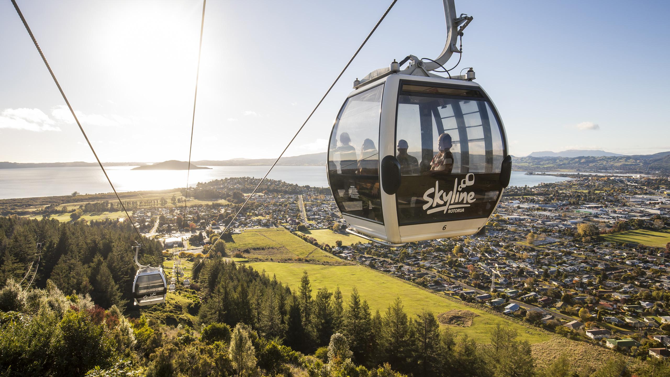 Gondola Rotorua with bright sun in the background
