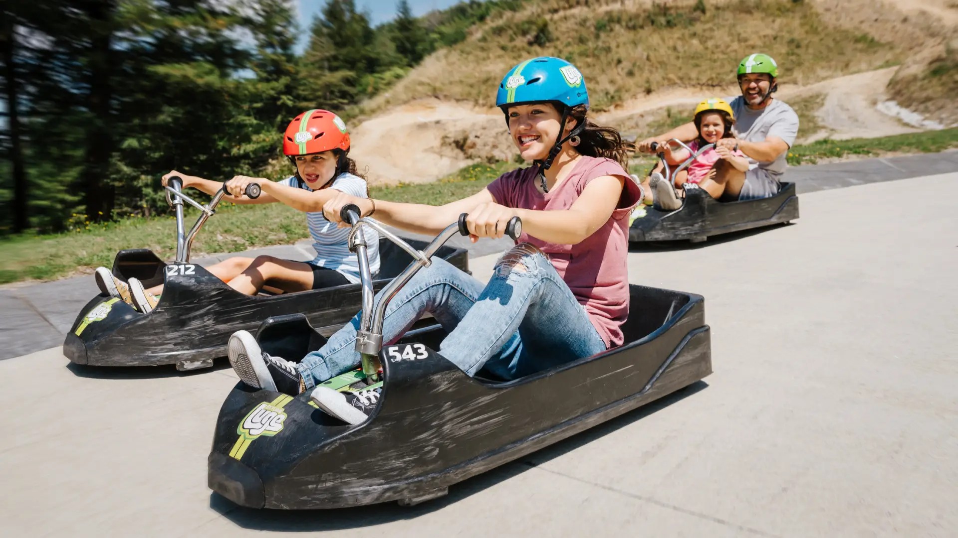Family enjoying the Luge at Skyline Rotorua
