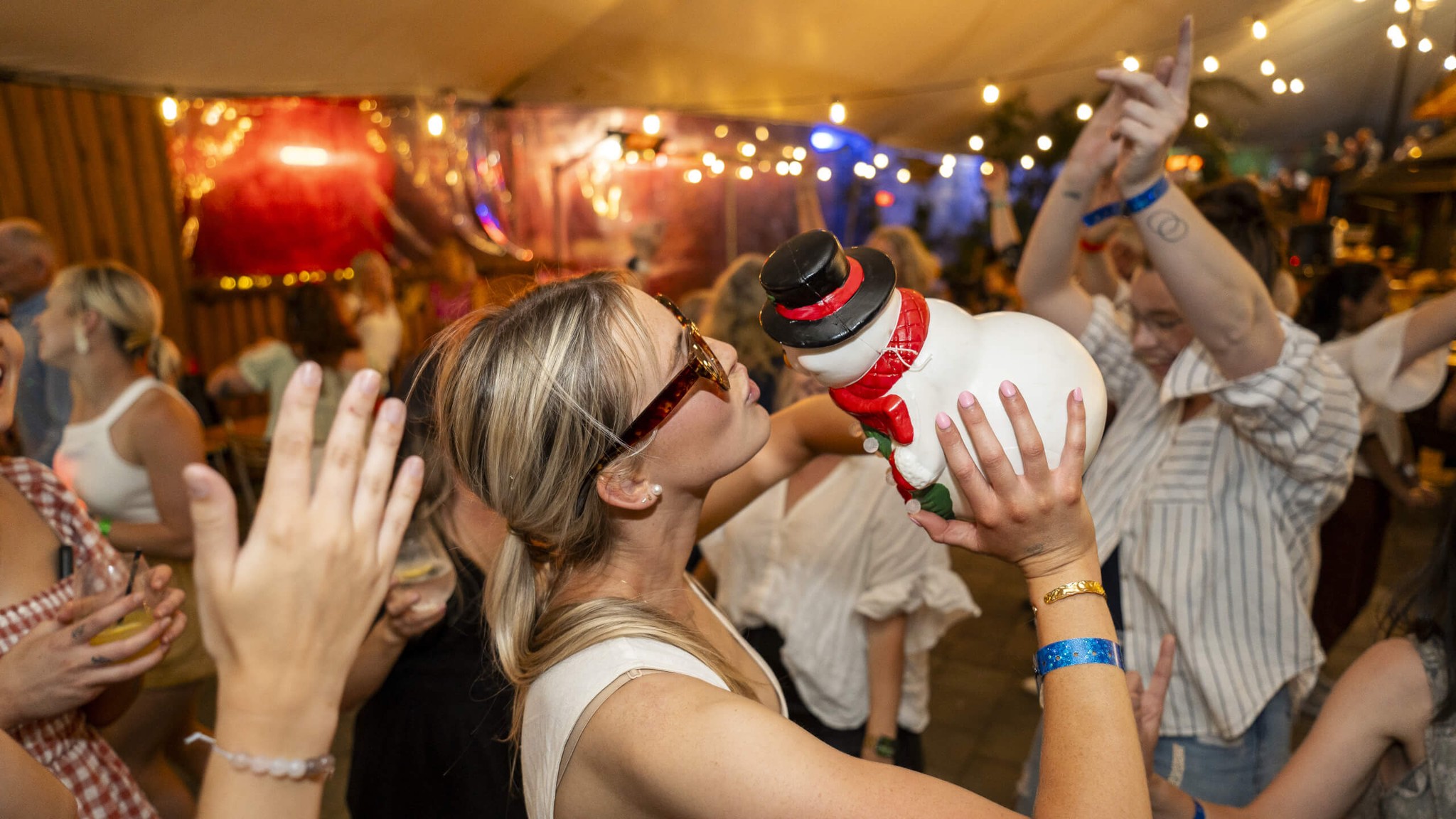 Guests enjoying lively atmosphere at Skyline Rotorua Christmas function
